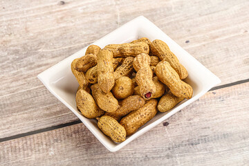 Raw ripe unpeeled peanut heap