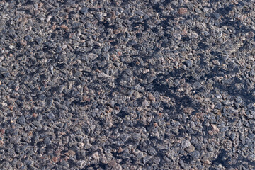 a part of an asphalt highway in close-up