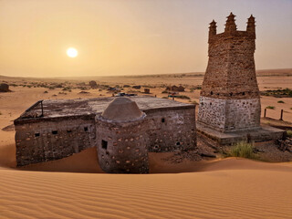 Ancient city of Chinguetti at sunset in Sahara Desert 