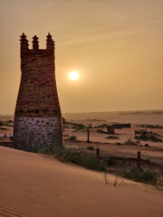Ancient Mosque in Mauritania at sunset 