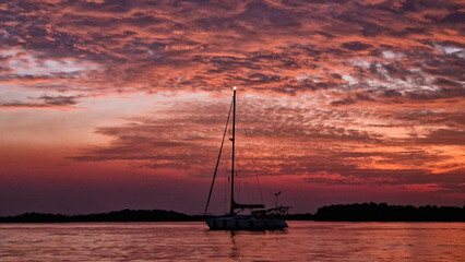 Boat in the Atlantic Ocean at sunset 