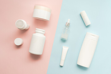 A lot of bottle and jar for cosmetic on two colored background