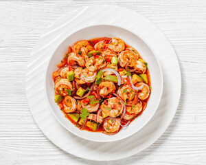 mexican shrimp cocktail salad in a bowl, top view