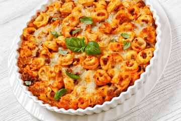 tortellini bake with cheese, tomato sauce, beef