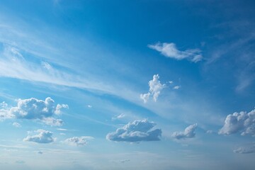 Bright blue sky with cumulus and cirrocumulus clouds, day  - obrazy, fototapety, plakaty
