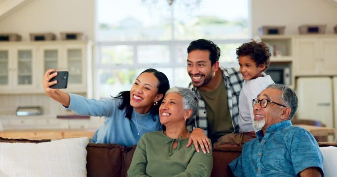 Selfie, smile and happy big family on a sofa bond, relax and chilling at home together. Smartphone, photo and boy child with parents and grandparents in a living room with love and profile picture