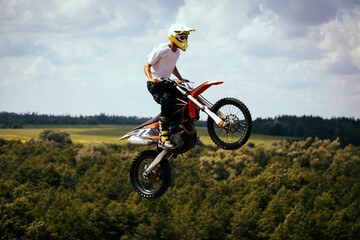 Extreme free ride motocross in fields.