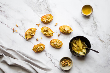 Appetizer bruschetta with pear, honey, walnut and blue cheese