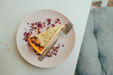 Sweet dessert cheesecake on a plate in a restaurant. High quality photo
