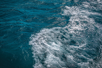 Blue sea water with foam texture