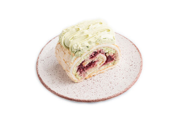 Roll biscuit cake with cream cheese and jam isolated on white, side view