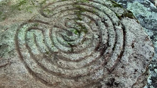 concentric circle archaeological petroglyph rings in rocks