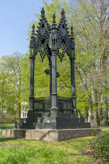 Decorated grave cross with canopy in the old cemetery in Flensburg