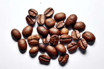 Naklejka premium Closeup of roasted espresso beans with aroma for gourmet delights on white background isolated