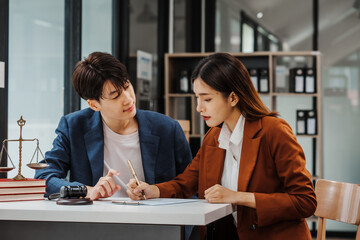Professional legal system lawyers Korean asian people meeting and discussing including criminal, civil, administrative law, constitutional law, not just legal disputes. In fact, seeking legal advice