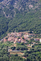 Fototapeta na wymiar The Village of Ota on Corsica Set in a Hillside in the Mountains Near the Gulf of Porto
