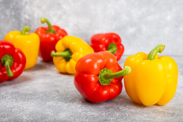 PAPRIKA.Fresh yellow and red bell pepper isolated on white background. Bulgarian salad pepper .Fresh vegetables. Harvest. Vegan. closeup. Place for text. copy space.