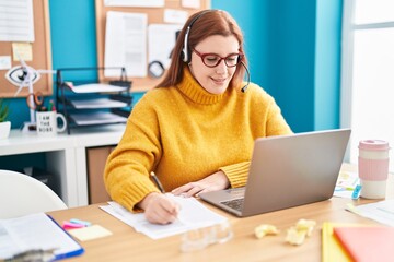 Young beautiful plus size woman call center agent smiling confident working at office