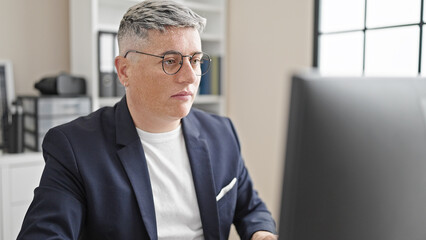 Young caucasian man business worker using computer working at the office