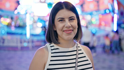 Young beautiful hispanic woman smiling confident standing at Prater Vienna