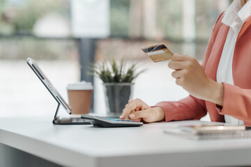 Excited Asian business woman secretary working with product liability, Scarcity, Negotiate, Proposal, Advertising Cost & How to Buy Ads on Any Budget, Interest rate, Dividend, Demand, Remuneration