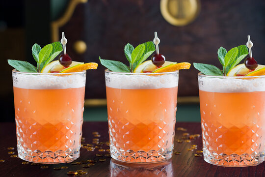 beverage, cocktail, refreshment, bar, food, drink, juice, glass, alcohol, fresh, fruit, ice, garnish, cold, background, syrup, alcoholic, citrus, tropical, wooden, gin, party, refreshing, closeup, red