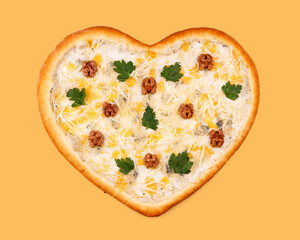 appetizing pizza in the shape of a heart with 4 cheeses (mozzarella, dor blue, parmesan and gouda) on a yellow background, studio shot 1