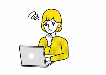 パソコン画面を見て悩む女性