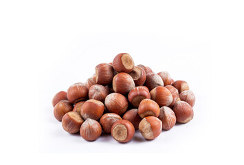 Shelled hazelnuts on the white background