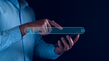 Data Search Technology Engine Optimization. Businessman hand touch searching icon for information...