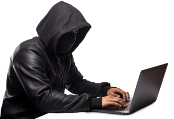 A hacker in black hoodie is working on his laptop.