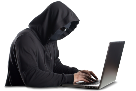 A hacker in black hoodie is working on his laptop.