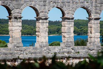 Roman arches in front of the sea