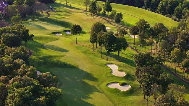 Aerial view of a golf course in 4K