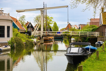 Fototapeta na wymiar View of the Ketting Brug drawbridge crossing the canal in the city Edam, Netherlands