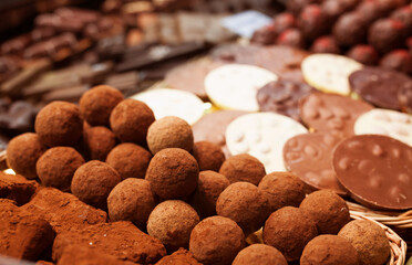 Chocolate truffle balls on market counter