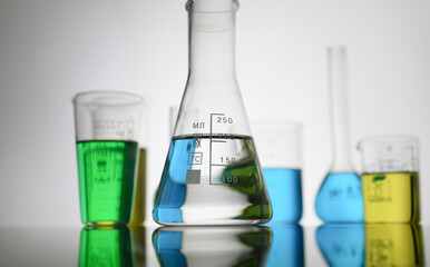 Chemical industry bulb with blue magenta test tube background. alcohol