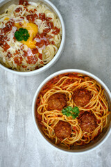 Spaghetti Carbonara Cream Sauce with egg and spaghetti with meatball, classic Italian pasta
