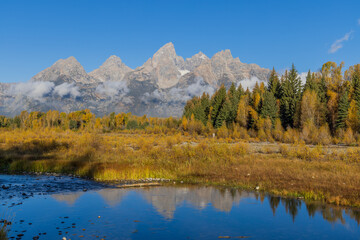 Fototapeta na wymiar Autumn Landscape Reflection in the Tetons