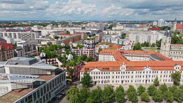 Aerial Drone shot of the Green Citadel (Gr&uuml;ne Zitadelle) by Friedensreich Hundertwassers in Magdeburg city, Saxony-Anhalt, Germany .