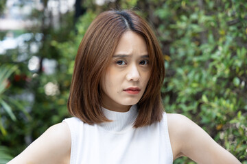 Intense Stare, Angry Woman with Powerful Gaze Expressing Frustration