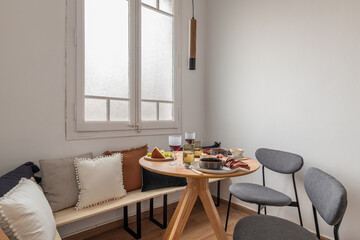 Cozy dining area with table and chairs in domestic room