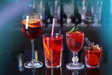 Many glasses of delicious refreshing sangria on counter in bar