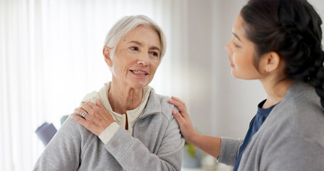 Consultation, physical therapy and senior woman with a nurse in a medical clinic or rehabilitation center. Healthcare, wellness and elderly female patient talking to a physiotherapist at a checkup.