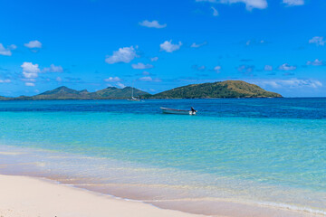 Boats at the tropical sandy beach