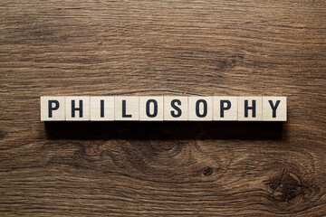 Philosophy - word concept on building blocks, text