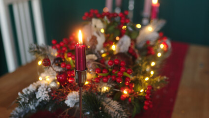 Fototapeta na wymiar christmas table, christmas deck, festive dinner, table setting has Christmas decorations in the living room, a blurred bokeh on the new year's deck table, a rustic vintage Xmas background