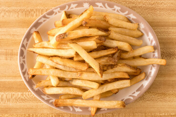 fresh cut french fries on a plate