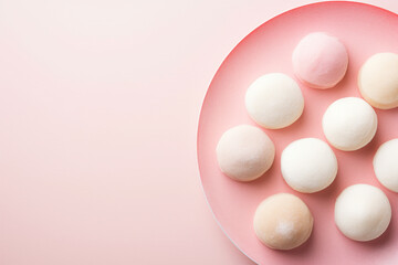 Fototapeta premium Top view of Japanese Mochi sweets, a cake made of mochigome rice
