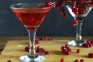 glass of red wine with berries